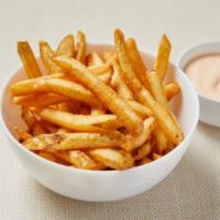 French Fries · Hand-cut russet fries with seasoned salt served with vegan chipotle aioli. Vegan. Gluten-free.