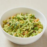 Guacamole · Homemade creamy avocado dip with, onion, tomato, cilantro and lime. Served with choice of gl...