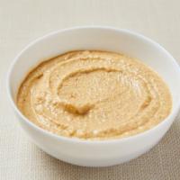Almond Dip · Homemade almond dip with garlic, lemon and secret spices. Served with choice of gluten-free ...