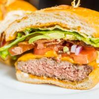 Cheeseburger · USDA prime ground beef, with cheddar, jack, or Swiss, on a French roll with lettuce, onions,...