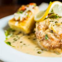 Chicken Piccata · Boneless organic chicken breast, baked, and topped with lemon butter caper sauce, served wit...