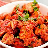 Vegan Sautéed Mushroom with Tomato · Button Mushroom, tomatoes, chopped onions with aromatic spices.