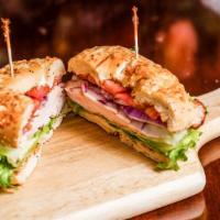 Peppered Turkey Sandwich · Peppered Turkey, lettuce, tomato, red onion, and 1000 island sauce