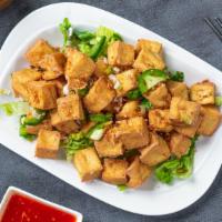 Fried Tofu · Deep-fried soft tofu served with a sweet and sour chili sauce. Gluten-free.