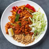 Burmese Pad Thai Noodles · Rice noodles mixed with tofu, red bell pepper, onions, scallion, bean sprouts, egg, paprika,...