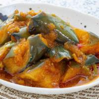 Burmese Eggplant Curry · Onion based curry with eggplant, ginger, garlic, paprika, turmeric, tamarind, and masala. 
V...