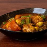 Egg & Okra Curry · Onion based curry with eggs, tomatoes, okra, ginger, garlic, paprika, turmeric, tamarind and...
