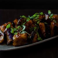 Garlic Shrimp & Eggplant · Sautéed shrimp and eggplant served with garlic, ginger, scallions, basil, soy sauce, sambal ...