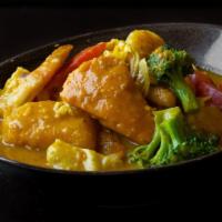 Pumpkin Shrimp Curry · A delicious stew made with shrimp, locally grown pumpkin, fresh onion, garlic, ginger, and B...