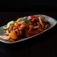 Sweet 'n Sour Chicken · Crispy chunks of chicken, pineapple, bell pepper mix, and tomato in a sweet 'n sour sauce.