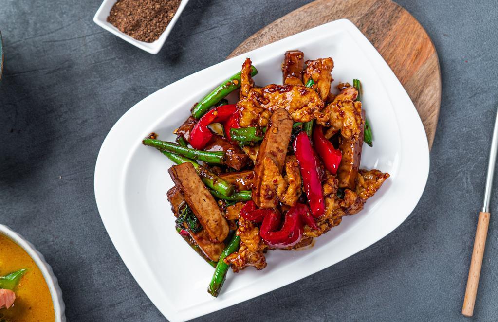 Chicken Tofu · Wok fried chicken with tofu, string beans, bell peppers, garlic, ginger, sambal chili, vinegar, basil, in a hoisin and oyster sauce.
Gluten-free option available.