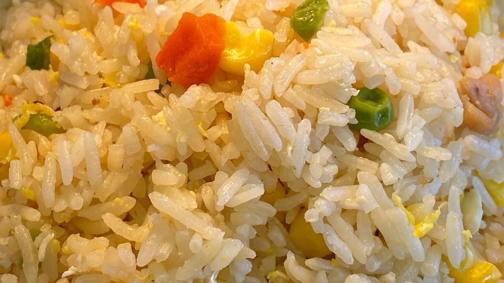 Fried Rice · Contains chicken, eggs, peas and carrots.