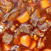 Beef Stew · Chunks of beef with carrots. Contain peanuts.