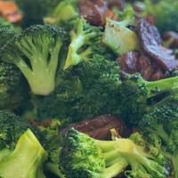 Broccoli & Beef · Stirred fried broccoli and beef and soy sauce based marinade with beets and carrots.