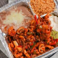 Mix Fajitas · Like fajitas but comes with 2 more proteins in the dish (steak, chicken, and shrimp). Served...