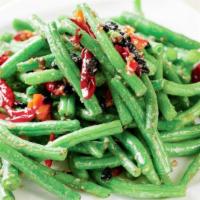 Dry Braised String Beans · 干煸四季豆 
String beans sauteed in soy sauce with black beans.