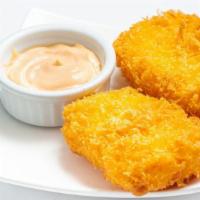 Shrimp Croquette · 2 Shrimp Croquettes fried to a golden brown and served with dipping sauce.