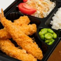 Ebi Fry Curry Bento · Deep fried shrimp. Served with housemade curry, edamame, and Japanese style salad.