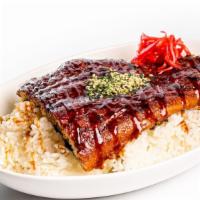 Unagi Don · Grilled whole unagi fillet served over a bed of rice with unagi sauce and a side of Japanese...