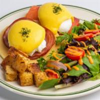 Egg Benedict Pancakes · Wild smoked salmon and Canadian bacon served on pancakes with hollandaise sauce, poached egg...