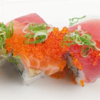 Rainbow Roll · Shrimp tempura, hamachi, tuna, salmon, tai, cucumber, avocado, green onion, eel sauce, and s...
