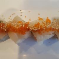 Romeo & Juliet Roll · Soy paper with salmon and avocado, scallop outside with tobiko, eel sauce, and sesame.