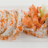 Spider Roll · Deep-fried soft shell crab, cucumber, mountain Carrot, avocado, tobiko, eel sauce, and sesame.