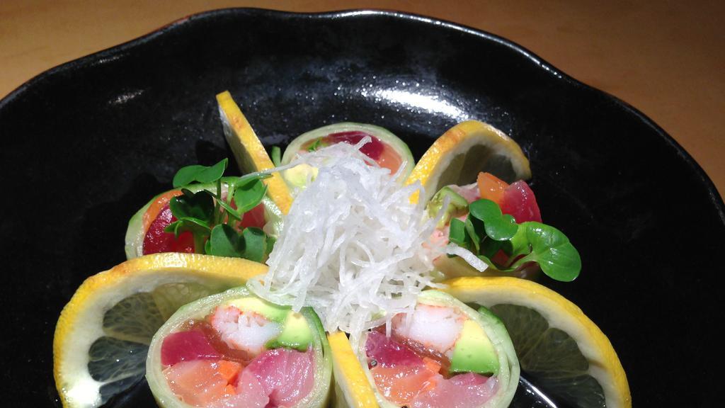 Naruto Roll · Cucumber wrapped with tuna, salmon, yellowtail, gobo, kanpyo, avocado, crab, and sunomono sauce.
Soy paper in it( sesame seed )
NO RICE INSIDE