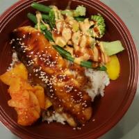 Salmon Teriyaki Bowl · Salmon teriyaki over steam rice. Served with miso and salad.