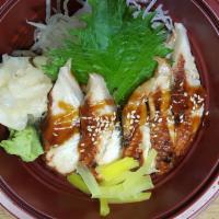 Unagi Donburi · Broiled eel over rice with teriyaki sauce. Served with miso soup and salad.
