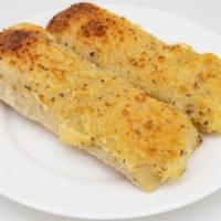 Cheesy Garlic Bread · Fresh whole garlic bread loaf with melted cheese.