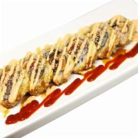 Godzilla · Unagi, hamachi, salmon, unagi sauce, spicy mayo, wasabi sauce.