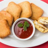 Paneer Pakoras · Fresh cottage cheese dipped in chickpea batter. Served with chutney.