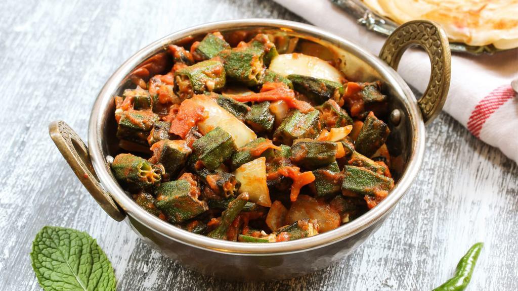 Bhindi Masala · Farmers market fresh okra marinated with onions, tomatoes, and Indian spices.