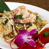 One Waan Sukiyaki · Wok-fired moroheiya noodle, prawns, calamari, chickens, garlic's, egg, spinach and Napa cabb...