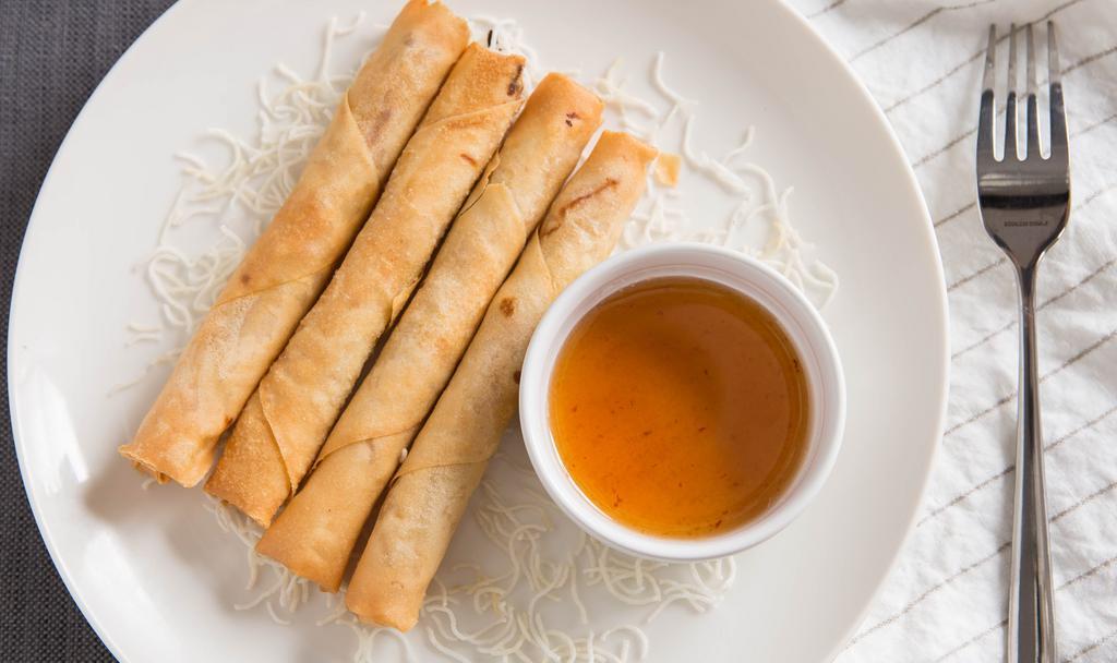 Veggie Crispy Roll · Vegetarian egg rolls filled with clear noodles, mushrooms, carrots and cabbage with sweet and sour sauce.
