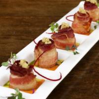 Bacon Wrapped Scallop · Tender sea scallop lightly wrapped in smoky bacon and garlic butter with three flavors cream...