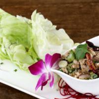 Lettuce Wrap · Gluten-free. Minced chicken, red and green onions, cilantros, lemongrass, mint, lava sauce w...