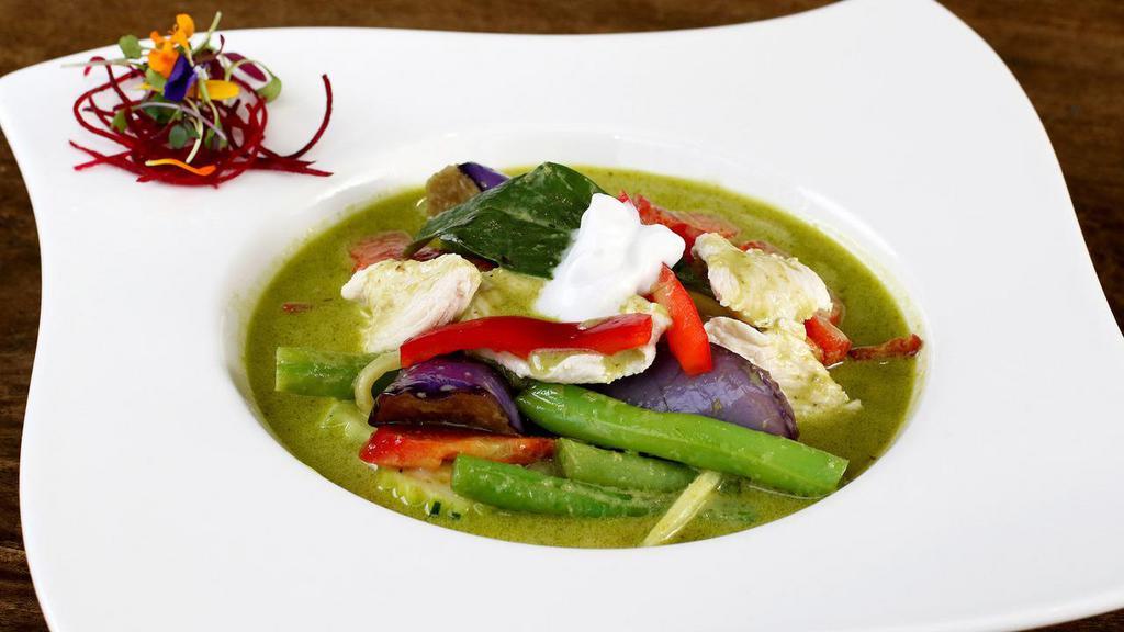 Green Curry · Gluten-free. Medium. Chinese eggplant, fresh green chili paste, garlic's, coconut milk, bell peppers, basils, zucchinis and bamboo shoots.