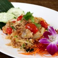 Tom Yum Fried Rice · Mild. Stir fried rice seasoned with Thai chili paste and tom yum sauce, onions, tomatoes, mu...
