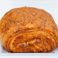Pain au Chocolat · Our chocolate croissant has ultra thin layers that add to it's buttery layers, filled with c...
