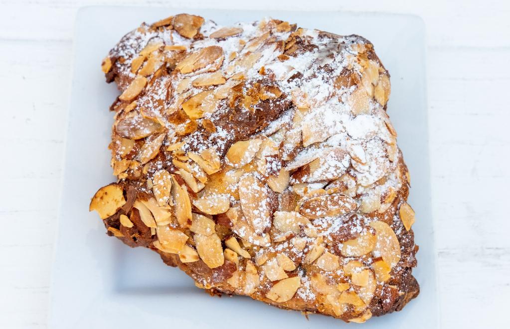 Almond Croissant · The classic version of the breakfast pastry with a sweet almond filling swirled throughout the dough and topped with toasted almonds baked right on top.