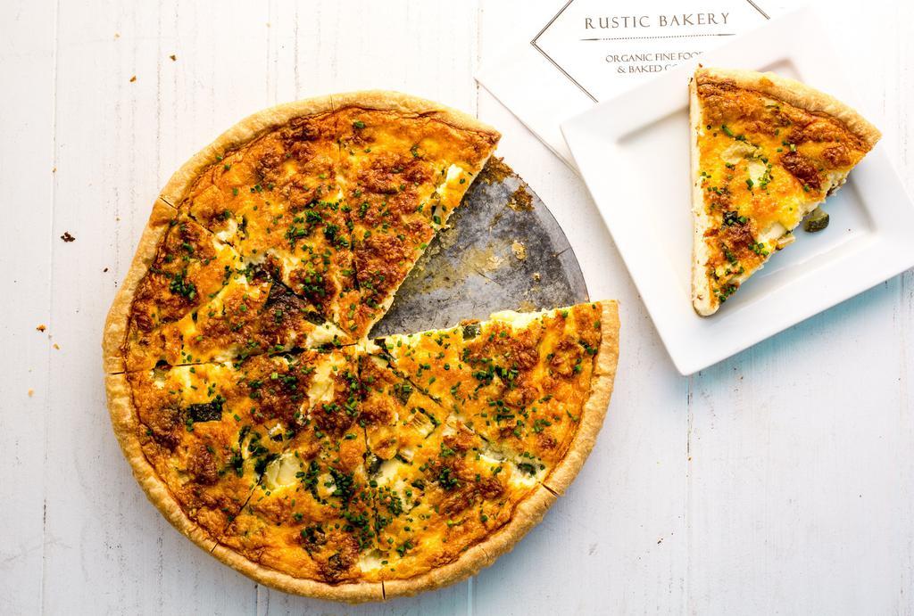 Quiche of The Day · Our daily quiche - offered by the slice or whole quiche.  Whole Quiche serves 8-12 people
