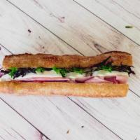 French Ham & Brie Ficelle · French Ham and Marin Farms Brie on a buttered Ficelle baguette with organic baby greens.