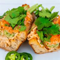 Saigon Sandwich · Thinly sliced organic roasted chicken breast, pickled carrots & daikon, cucumber, cilantro w...