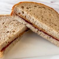 PB&J Sandwich · Peanut butter & jelly on our Honey Whole Wheat Bread