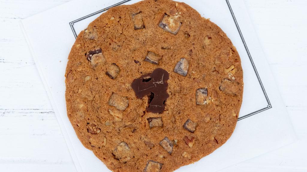 Chocolate Chunk Cookie with Pecans · Large, house-made chocolate chunk cookie made in small batches with Straus butter, organic flour, Valrhona chocolate and pecans. Crunchy on the outside and tender and chocolaty on the inside.