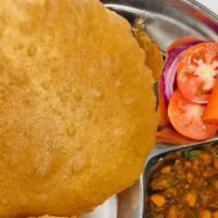 Chole Bhature · Vegan. It's 2 deep-fry bread , comes with chana masala curry (chickpeas)