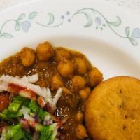 Aloo Tikki Chole · Vegan. Mashed potato filled with cheese, all kind Indian spice, deep fry, served with Garban...