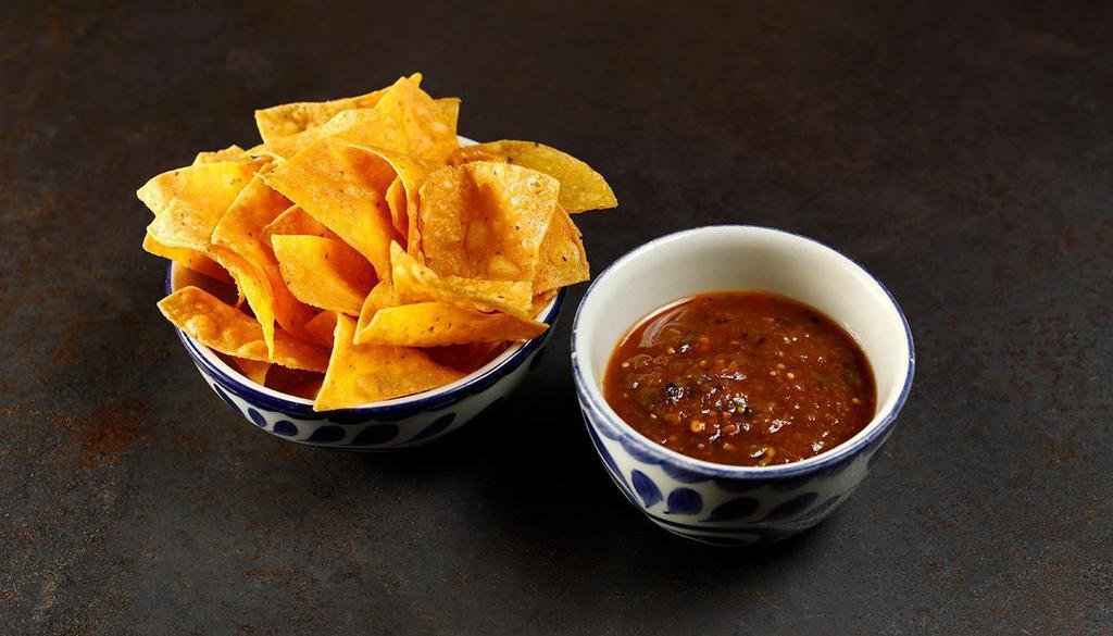 TOTOPOS · chips and molcajete salsa